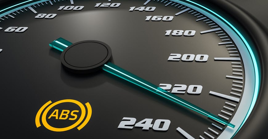 Car speedometer with ABS warning light illuminated