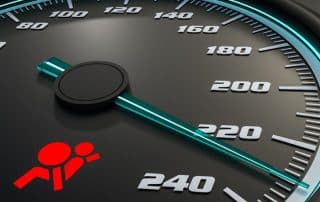 Car speedometer with airbag warning light on