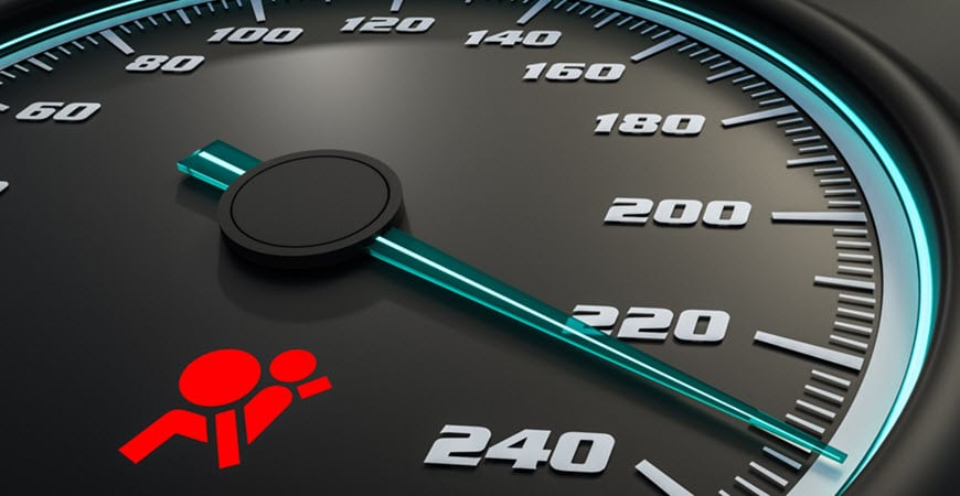 Car speedometer with airbag warning light on