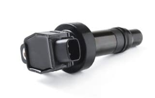 Automotive ignition coil on white background