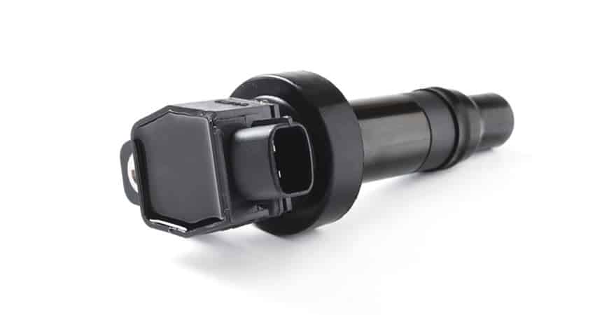 Automotive ignition coil on white background