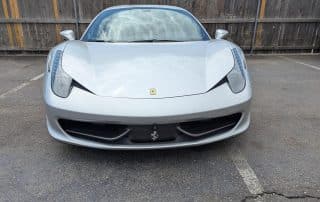Front view of silver Ferrari sports car