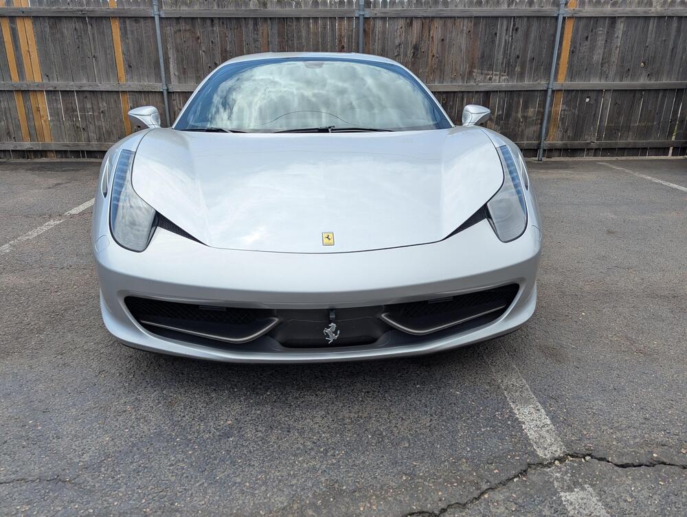 Front view of silver Ferrari sports car