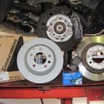 Car brake discs and drums on lift