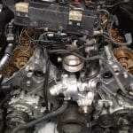 Car engine with exposed timing chains and components