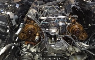 Car engine with exposed timing gears and components