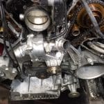 Exposed car engine with visible timing chains