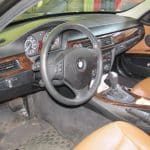BMW interior with steering wheel and dashboard