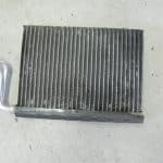Automotive heater core with aluminum fins and pipe