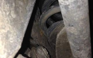 Close-up of vehicle suspension and coil spring