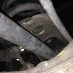 Close-up of vehicle suspension and steering components