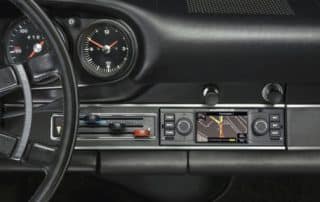 Classic car dashboard with modern navigation system
