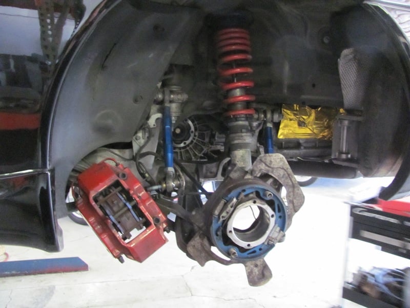 Car suspension and brake assembly without wheel