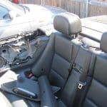 Convertible interior with removed door panel and back seats