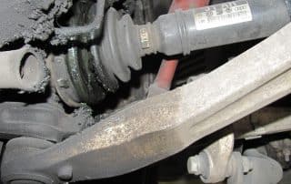 Close-up of car suspension and CV axle joint