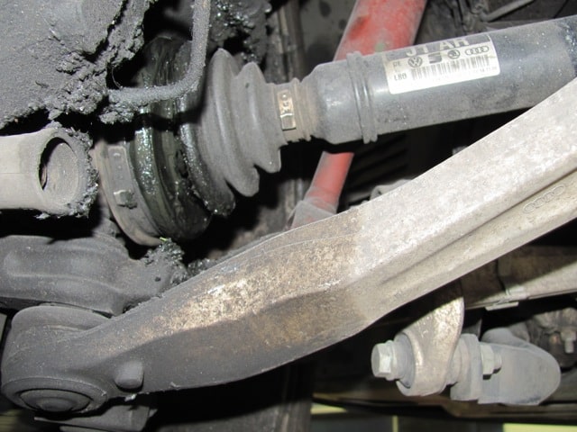 Close-up of car suspension and CV axle joint