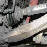 Close-up of car suspension and CV axle joint