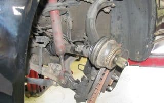 Car suspension and brake assembly exposed